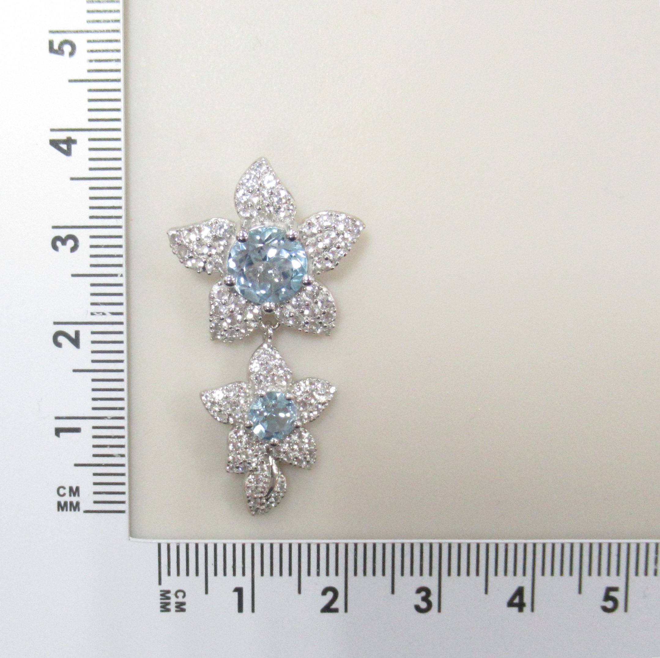 Серебряная подвеска 925 пробы; вставки 2 Топаз 2,7ct; Россыпь Топаз бел. 1,15ct;
